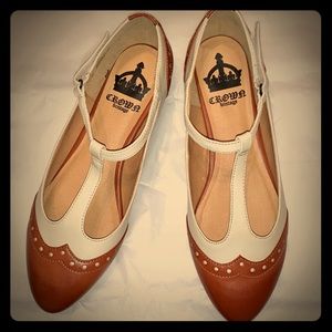 Cognac and cream colored spectator flats